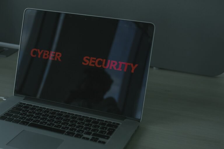 Close-up of a laptop screen displaying cybersecurity-related text